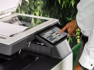 A man using a printer